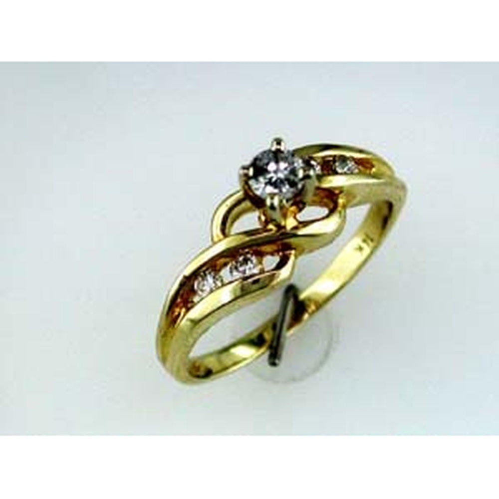 14K Yellow Gold Free Form Engagement Ring with Round Center Diamond and Channel-Set Baguette Accents - 0.22 Carat Total Diamond Weight - Royal Jewelry