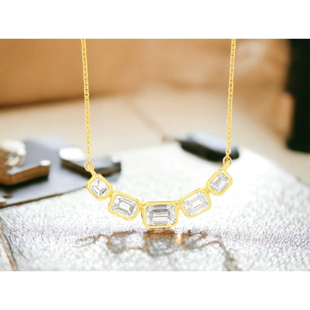 14K Yellow Gold Graduated Bezel-Set Emerald Cut Diamond Necklace - 0.80 Carat Total Diamond Weight - Royal Jewelry