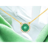 14K Yellow Gold Halo Pendant Necklace with Round Emerald and Diamond Accents - 0.90 Carat Emerald and 0.27 Carat Total Diamond Weight - Royal Jewelry