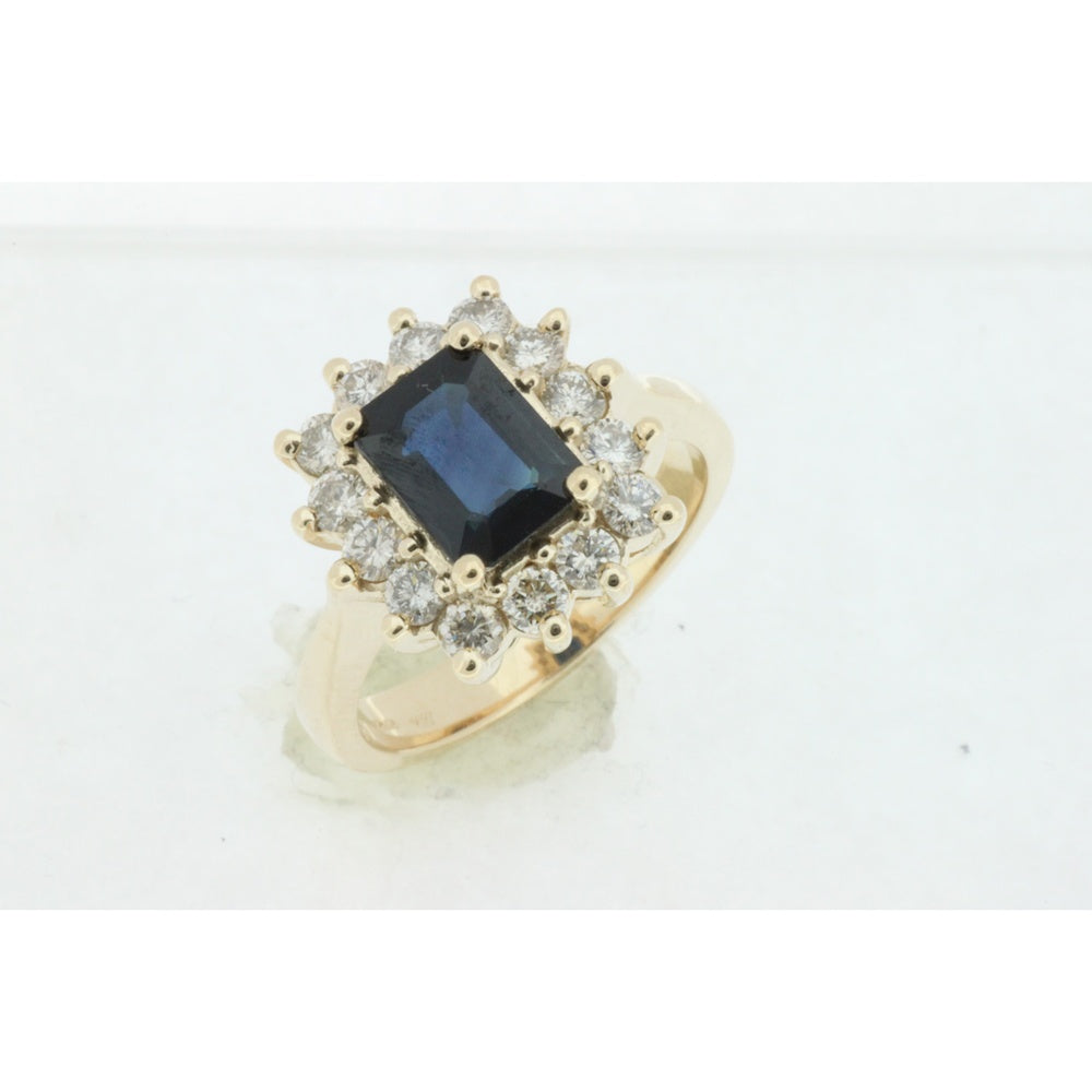 14K Yellow Gold Halo Ring with Emerald Cut Sapphire and Round Diamonds - 1.85 Carat Sapphire and 0.85 Carat Total Diamond Weight - Royal Jewelry