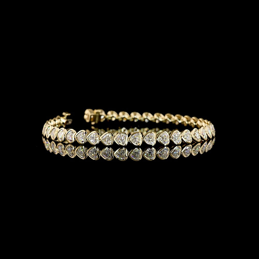 14K Yellow Gold Heart-Shaped Diamond Tennis Bracelet with East-West Bezel Setting - 38 Lab-Grown Diamonds 7.30 Carats Total Weight E-F Color VS Clarity - Covaloro Fine Jewelry