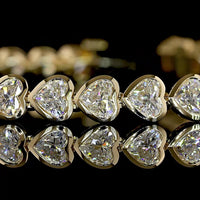 14K Yellow Gold Heart-Shaped Diamond Tennis Bracelet with East-West Bezel Setting - 38 Lab-Grown Diamonds 7.30 Carats Total Weight E-F Color VS Clarity - Covaloro Fine Jewelry