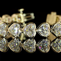 14K Yellow Gold Heart-Shaped Lab Diamond Tennis Bracelet with Bezel Setting - 15.90 Carat Total Weight, 28 Stones, E-F VS1 - Covaloro Fine Jewelry