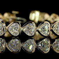 14K Yellow Gold Heart Shaped Lab Diamond Tennis Bracelet with East-West Bezel Setting - 13.04 Carat Total Weight - Covaloro Fine Jewelry