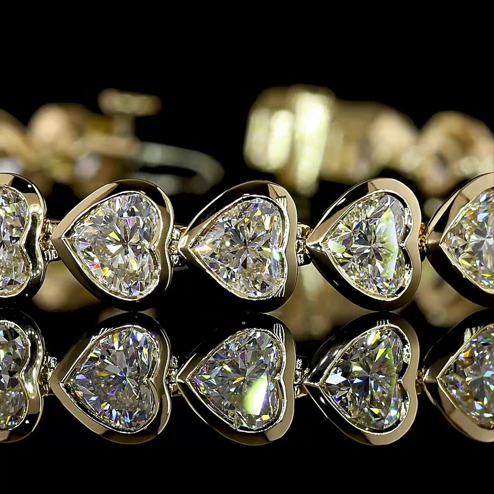 14K Yellow Gold Heart Shaped Lab Diamond Tennis Bracelet with East-West Bezel Setting - 13.04 Carat Total Weight - Covaloro Fine Jewelry