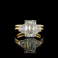 14K Yellow Gold Hidden Halo Ring with 3.54 Carat Emerald Cut Lab Diamond and Trapezoid Side Stones - 4.58 Carat Total Diamond Weight - Covaloro Fine Jewelry