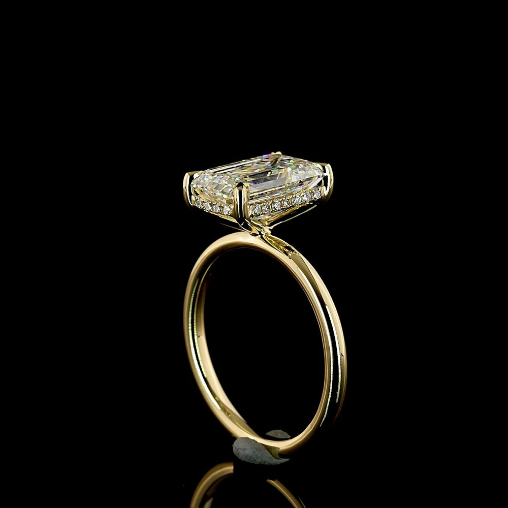 14K Yellow Gold Hidden Halo Ring with 3.54 Carat Emerald Cut Lab Diamond and Trapezoid Side Stones - 4.58 Carat Total Diamond Weight - Covaloro Fine Jewelry