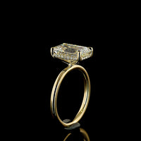 14K Yellow Gold Hidden Halo Ring with 3.54 Carat Emerald Cut Lab Diamond and Trapezoid Side Stones - 4.58 Carat Total Diamond Weight - Covaloro Fine Jewelry