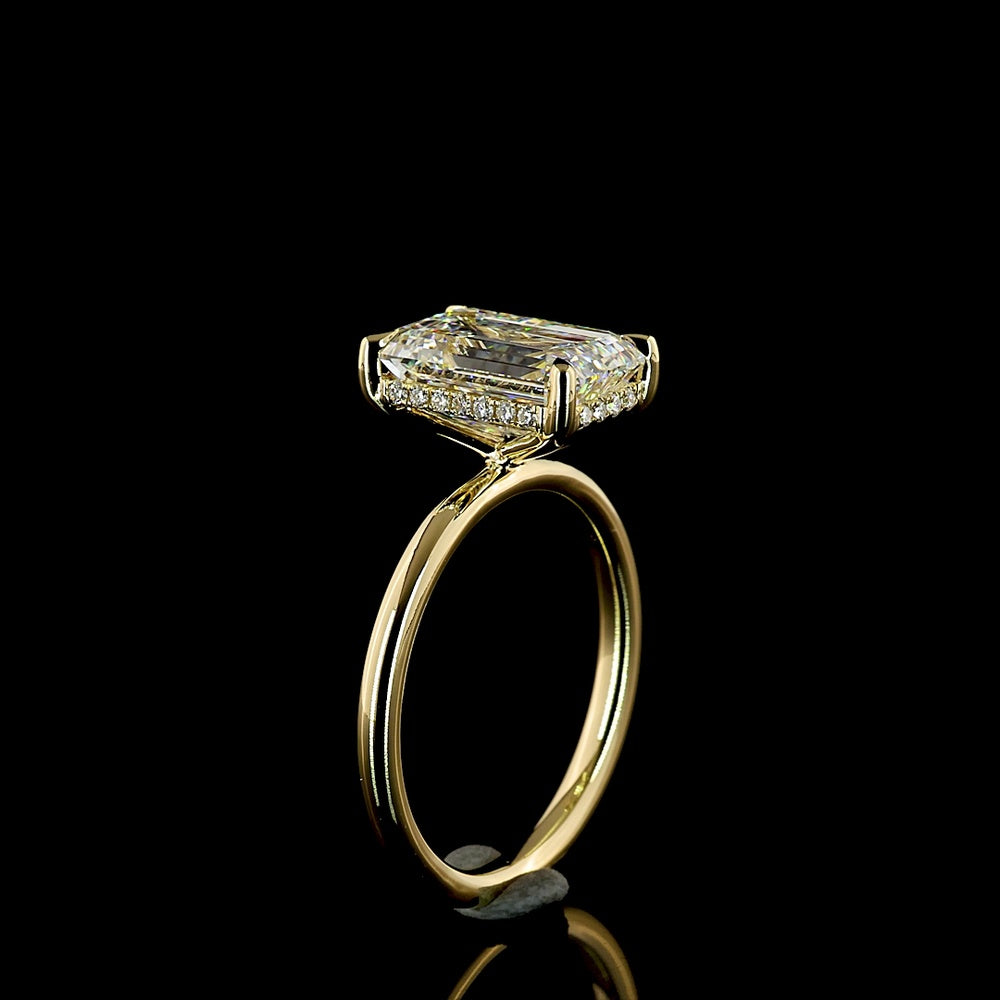 14K Yellow Gold Hidden Halo Ring with 3.54 Carat Emerald Cut Lab Diamond and Trapezoid Side Stones - 4.58 Carat Total Diamond Weight - Covaloro Fine Jewelry