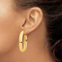14K Yellow Gold High Polished 7mm Omega Back Oval Hoop Earrings - 43.34mm Length by Oro Pregiato