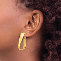 14K Yellow Gold High Polished 7mm Wavy Oval Hoop Earrings - Omega Back by Oro Pregiato
