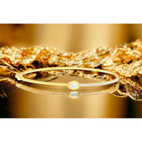 14K Yellow Gold Hinged Bangle Bracelet with Pear-Shaped Diamond and Pavé Set Round Diamonds - 0.55 Carat Total Diamond Weight - Royal Jewelry