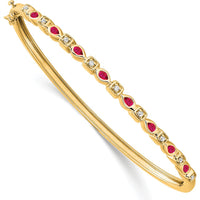 14K Yellow Gold Hinged Bangle Bracelet with Pear-Shaped Rubies and Round Diamonds - 0.05 Carats Ruby, 0.12 Carats Diamond Total Weight by Monteluci Fine Jewelry