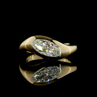 14K Yellow Gold Inclined Flush Set Solitaire Ring with 1.09 Carat Moval Cut Lab Diamond - E-F Color VVS2 Clarity - Covaloro Fine Jewelry