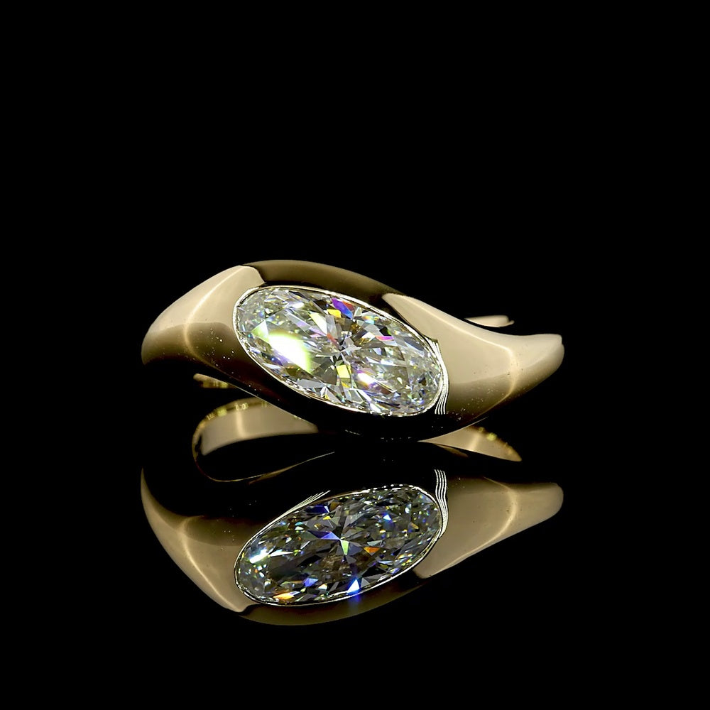 14K Yellow Gold Inclined Flush Set Solitaire Ring with 1.09 Carat Moval Cut Lab Diamond - E-F Color VVS2 Clarity - Covaloro Fine Jewelry