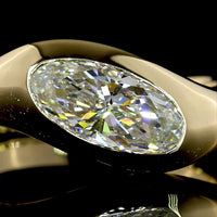 14K Yellow Gold Inclined Flush Set Solitaire Ring with 1.09 Carat Moval Cut Lab Diamond - E-F Color VVS2 Clarity - Covaloro Fine Jewelry