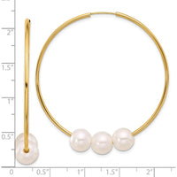 14K Yellow Gold Infinity Hoop Earrings with White Freshwater Cultured Pearls - 1.5 Carat Total Pearl Weight by Monteluci Fine Jewelry