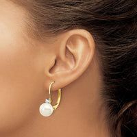 14K Yellow Gold Leverback Drop Earrings with 6-7mm Freshwater Pearls and 0.059 Carat Total Diamond Weight by Monteluci Fine Jewelry