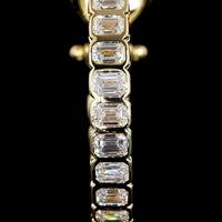 14K Yellow Gold Medium Omega Hoop Earrings with Bezel-Set Emerald Cut Lab Diamonds - 2.57 Carat Total Diamond Weight - Covaloro Fine Jewelry