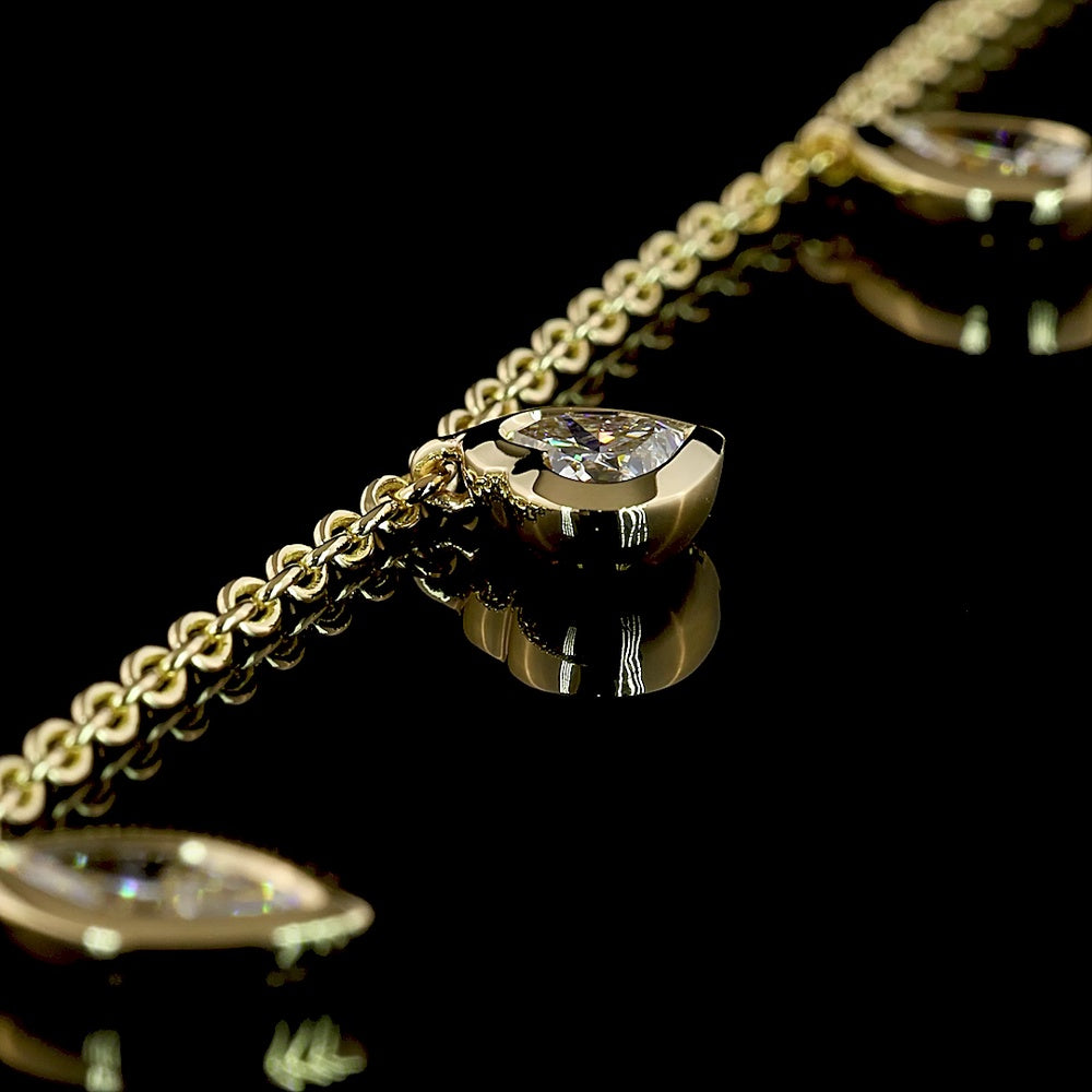 14K Yellow Gold Mixed Shape Station Bracelet with Bezel-Set Pear and Heart Lab Diamonds - 2.28 Carat Total Weight - Covaloro Fine Jewelry