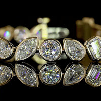 14K Yellow Gold Mixed Shape Tennis Bracelet with Bezel Set Lab Diamonds featuring Emerald, Pear, Marquise, and Round Cuts - 8.13 Carat Total Diamond Weight - Covaloro Fine Jewelry