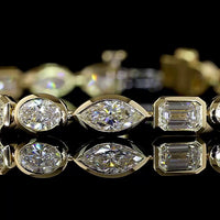 14K Yellow Gold Mixed Shape Tennis Bracelet with Bezel Set Marquise, Emerald, and Oval Lab Diamonds - 6.74 Carat Total Weight - Covaloro Fine Jewelry