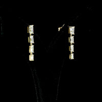 14K Yellow Gold North-South Hanging Earrings with 2.61 Carat Total Weight Emerald Cut Lab Diamonds - F VS2 & E VS1 - Covaloro Fine Jewelry
