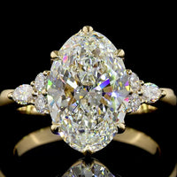 14K Yellow Gold North-South Oval Cut Lab Diamond Ring with Marquise and Round Accents - 3.31 Carat Total Diamond Weight, IGI Certified E-VS1 - Covaloro Fine Jewelry