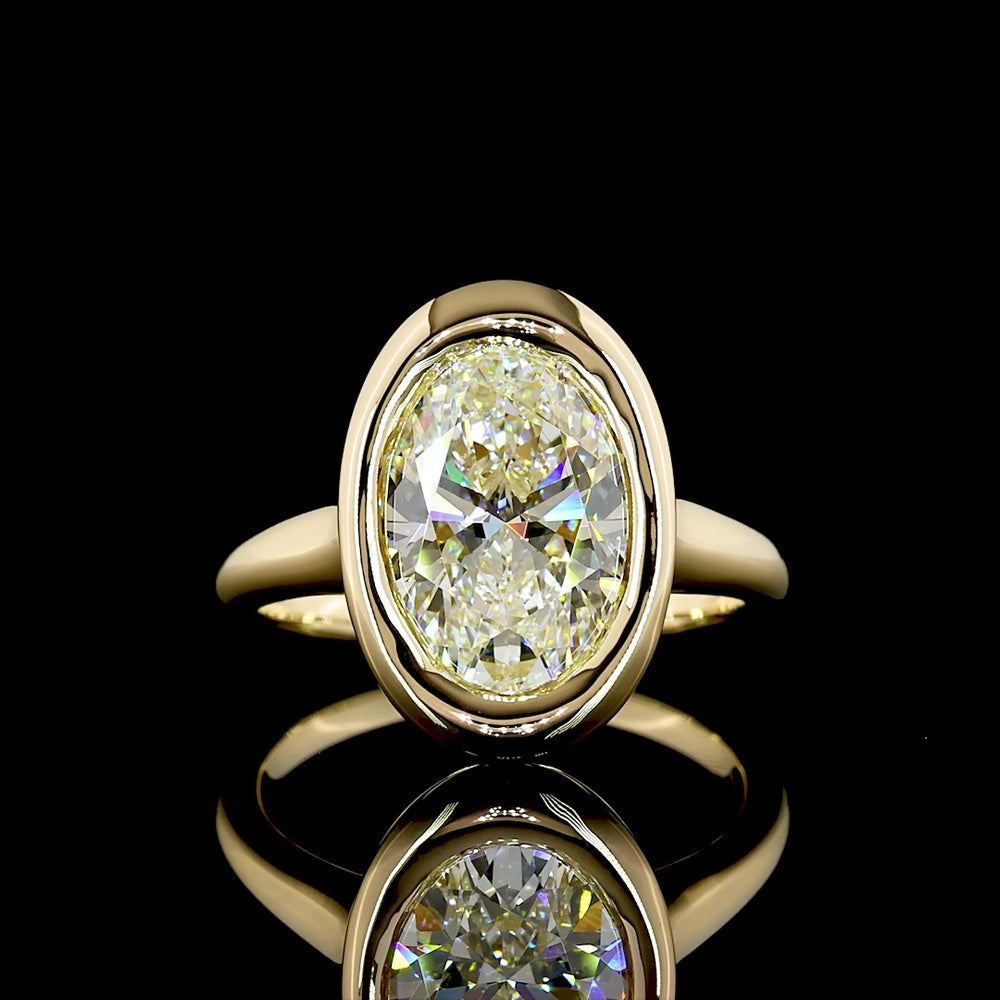14K Yellow Gold North-South Oval Solitaire Ring with Bezel Set Lab Diamond - 4.07 Carat Total Diamond Weight, E-F Color VVS2 Clarity - Covaloro Fine Jewelry