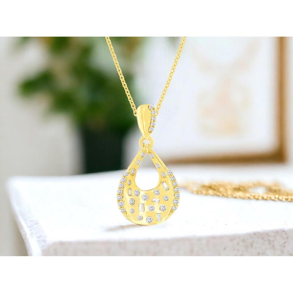 14K Yellow Gold Open Teardrop Pendant with Scattered Round and Baguette Cut Diamonds - 0.24 Carat Total Diamond Weight - Royal Jewelry
