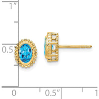 14K Yellow Gold Oval Blue Topaz Stud Earrings - 0.56 Carat Total Gemstone Weight by Monteluci Fine Jewelry