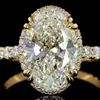 14K Yellow Gold Oval Cut Halo Ring with E VVS1 Lab Diamond Center 3.12 Carats and Shared Prong Brilliant Cut Side Stones - 3.88 Carat Total Diamond Weight - Covaloro Fine Jewelry