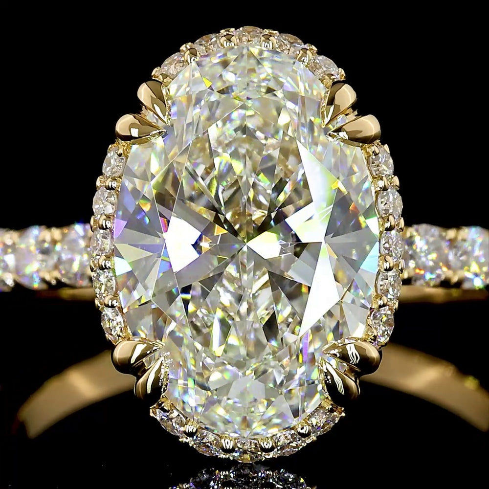 14K Yellow Gold Oval Cut Halo Ring with E VVS1 Lab Diamond Center 3.12 Carats and Shared Prong Brilliant Cut Side Stones - 3.88 Carat Total Diamond Weight - Covaloro Fine Jewelry