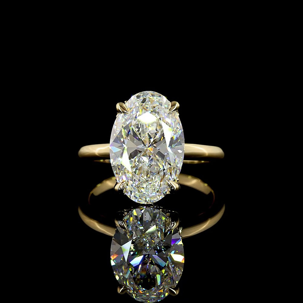 14K Yellow Gold Oval Cut Hidden Halo Ring with 5.13 Carat Lab Diamond Center and 0.19 Carat Brilliant Cut Lab Diamond Accents - IGI E VVS2 Certified - Covaloro Fine Jewelry