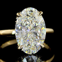 14K Yellow Gold Oval Cut Hidden Halo Ring with 5.13 Carat Lab Diamond Center and 0.19 Carat Brilliant Cut Lab Diamond Accents - IGI E VVS2 Certified - Covaloro Fine Jewelry