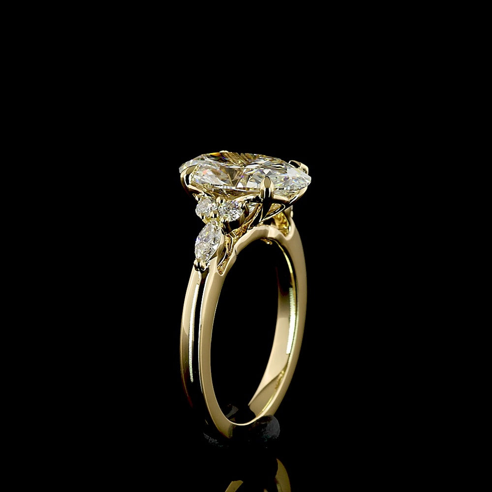 14K Yellow Gold Oval Cut Lab Diamond Ring with Marquise and Round Side Stones - 2.82 Carat Total Diamond Weight, E VS1 IGI Certified - Covaloro Fine Jewelry