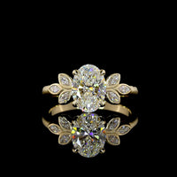 14K Yellow Gold Oval Cut Lab Diamond Ring with Marquise Leaf Motif Side Stones - 1.74 Carat Total Weight, D VVS2, IGI Certified - Covaloro Fine Jewelry