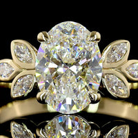 14K Yellow Gold Oval Cut Lab Diamond Ring with Marquise Leaf Motif Side Stones - 1.74 Carat Total Weight, D VVS2, IGI Certified - Covaloro Fine Jewelry