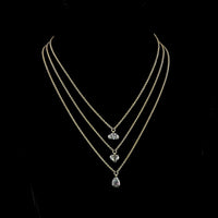 14K Yellow Gold Oval Cut Lab Diamond Solitaire Pendant with Black Rhodium Accent Prong Bezel Setting - 0.71 Carat Total Weight, E-F Color, VS Clarity - Covaloro Fine Jewelry