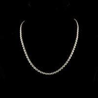 14K Yellow Gold Oval Cut Lab Diamond Tennis Necklace with East-West Bezel Settings - 21.19 Carat Total Weight, 59 Stones - Covaloro Fine Jewelry