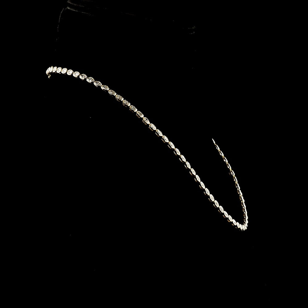 14K Yellow Gold Oval Cut Lab Diamond Tennis Necklace with East-West Bezel Settings - 21.19 Carat Total Weight, 59 Stones - Covaloro Fine Jewelry