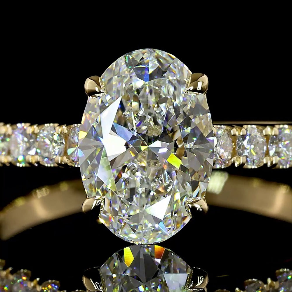 14K Yellow Gold Oval Cut Solitaire Shank Ring with 1.54 Carats E VVS2 Center and 0.63 Carats Brilliant Accents - 2.17 Carats Total Diamond Weight - Covaloro Fine Jewelry