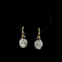 14K Yellow Gold Oval Drop Earrings with 3.09 Carat Total Weight Lab Grown Diamonds - F VS1 Clarity with Black Rhodium Bezel Detail - Covaloro Fine Jewelry