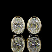 14K Yellow Gold Oval Lab Diamond Bezel Set Stud Earrings - 2.10 Total Carat Weight, E-F Color VVS2 Clarity - Covaloro Fine Jewelry