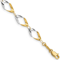 14K Yellow Gold Oval Link Bracelet with Polished Finish and Rhodium Accents - 7" by Oro Pregiato