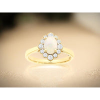 14K Yellow Gold Oval Opal and Diamond Halo Ring with Milgrain Detail - 0.50 Carat Opal and 0.35 Carat Total Diamond Weight - Royal Jewelry