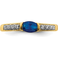 14K Yellow Gold Oval Sapphire and Diamond Ring with East-West Setting - 0.6 Carat Sapphire, 0.08 Carat Diamond Weight by 0