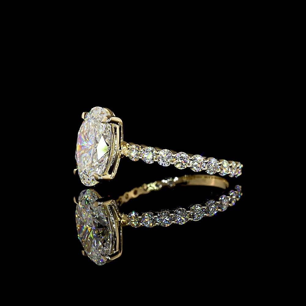14K Yellow Gold Oval Solitaire Diamond Shank Ring with 3.04 Carat E VVS2 Lab Diamond and 0.89 Carat Brilliant Cut Round Diamond Accents - 3.93 Carat Total Diamond Weight - Covaloro Fine Jewelry