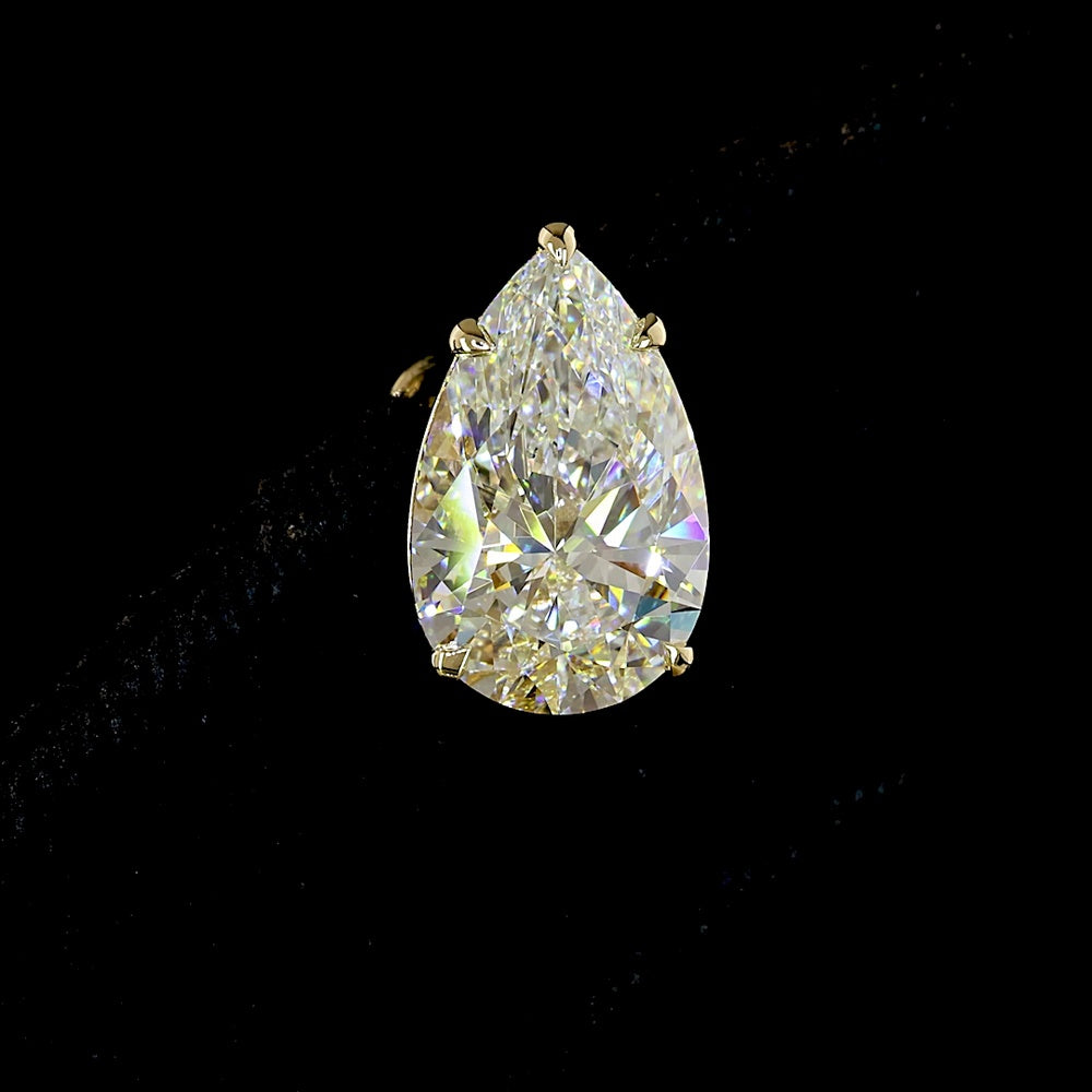 14K Yellow Gold Pear Shape Diamond Stud Earrings with North-South Prong Set Lab Diamonds - 5.04 Carat Total Weight (D-VVS2, IGI Certified) - Covaloro Fine Jewelry