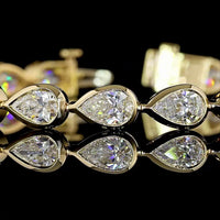 14K Yellow Gold Pear-Shape East-West Tennis Bracelet with Bezel-Set Lab Diamonds - 10.52 Carat Total Weight - Covaloro Fine Jewelry